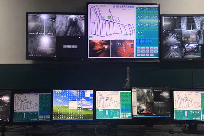 Control room displays used to supervise an underground rail haulage system
