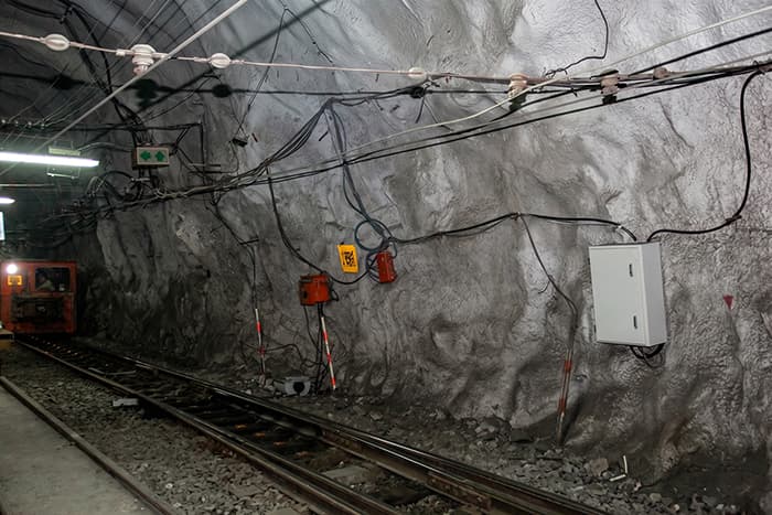 Underground rail route with installed communications and positioning equipment